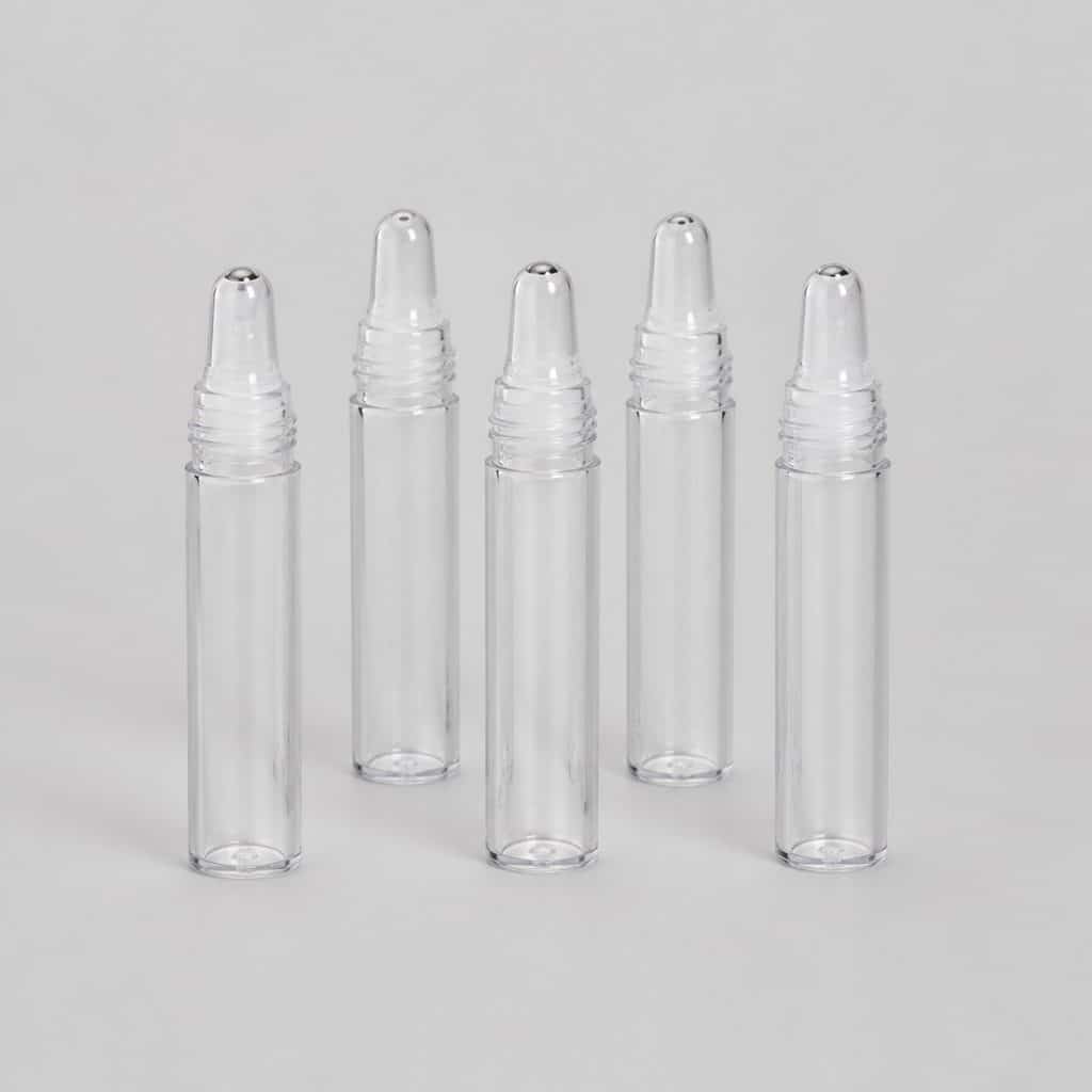 Lot de cinq tubes vides transparents pour gloss à lèvres