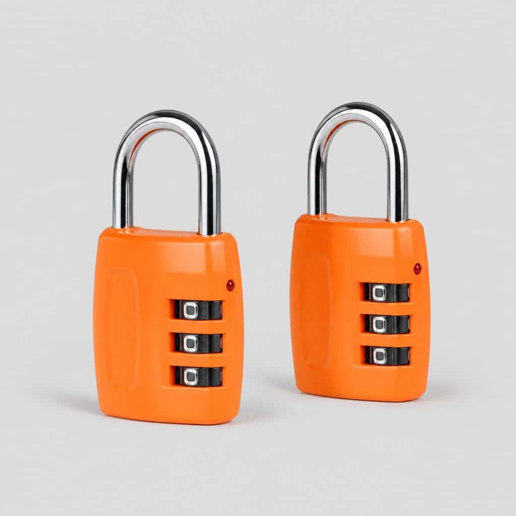 Deux cadenas orange vif avec molette à code